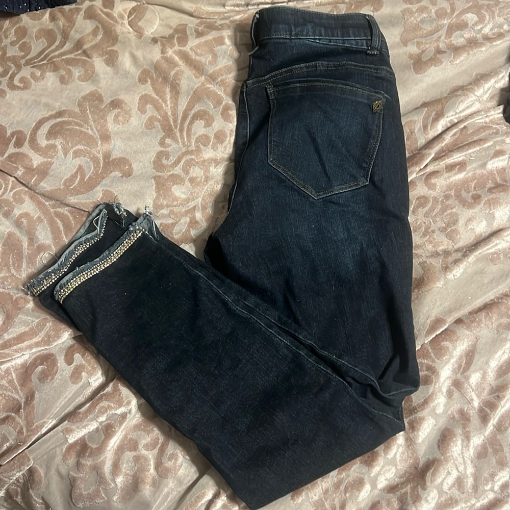 Size 4 Democracy “Ab”solution cropped jeans with rhinestone embellished hem.